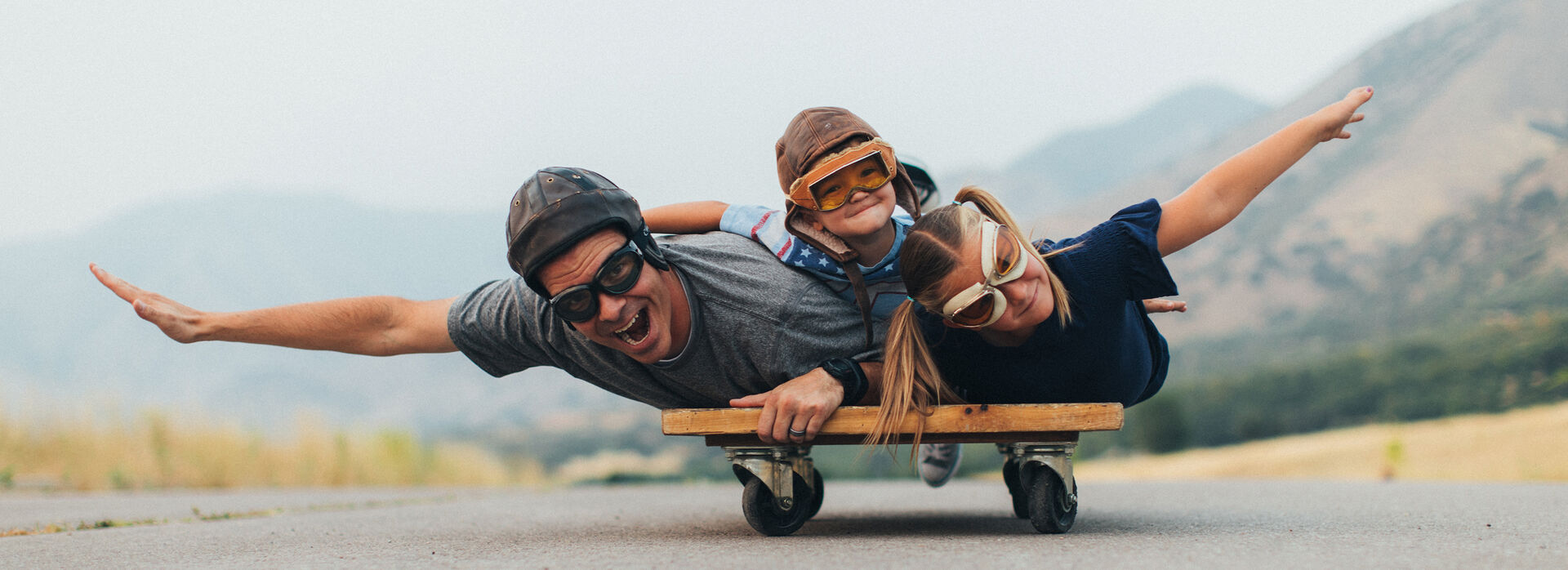 Father playing with his kids