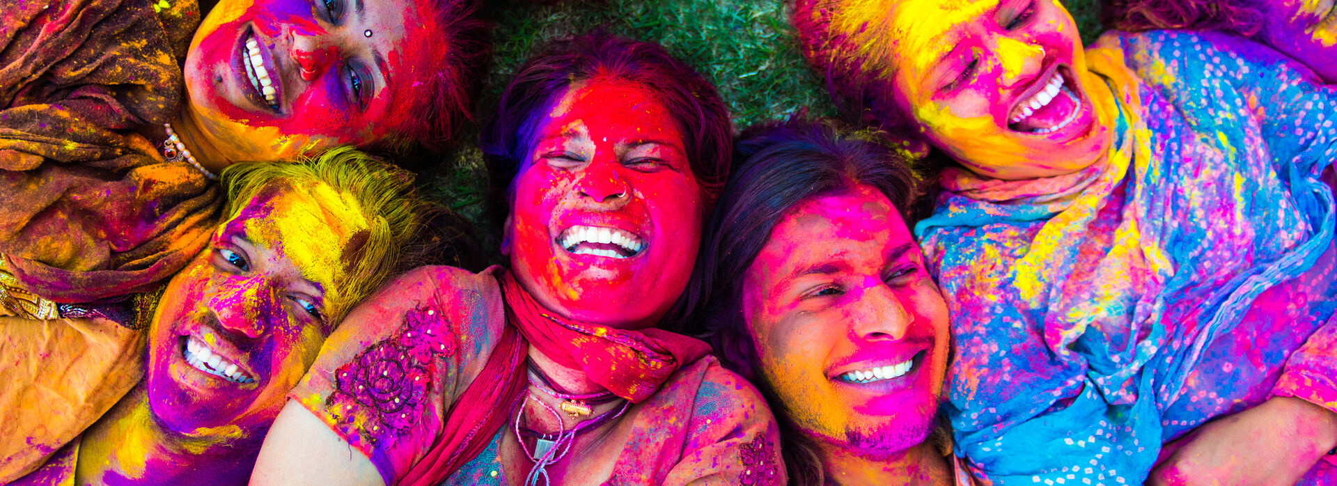 People smiling during Holi