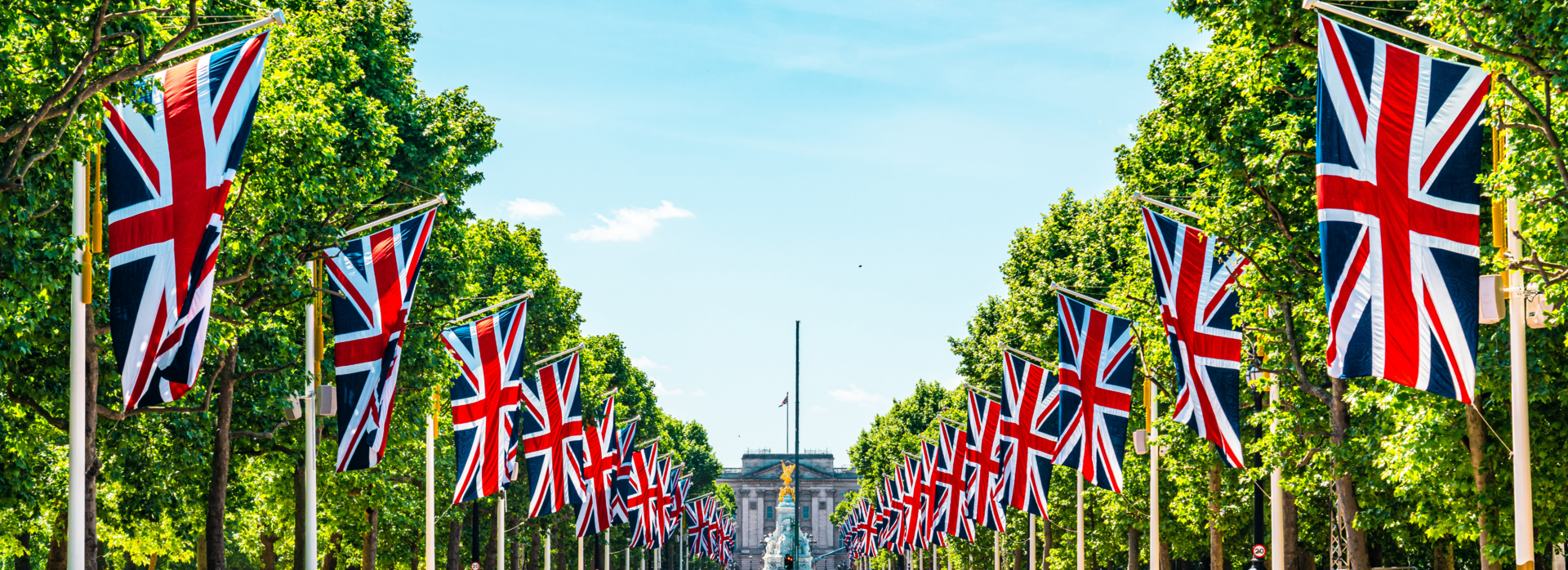English flags lining the driveway to the Royal Palace