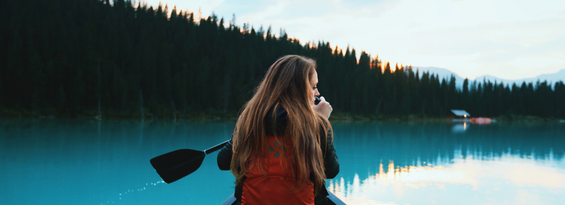 Landy canoeing on Lake Louise in Canada